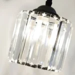 Close-up of premium K9 crystal lampshade showing brilliant light refraction and clarity.
