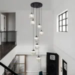 Spiral crystal chandelier for foyer entryway viewed from the second-floor landing.