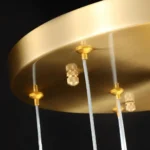 Reinforced canopy detail of the modern gold staircase chandelier hardware