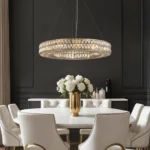 16-Light Drum Crystal Chandelier Hanging Over a Formal Dining Table