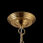 Close-up of the premium gold-finished ceiling canopy and mounting hardware of the pendant light.