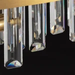 Close-up detail of high-grade K9 linear crystal pendants showing rainbow light refraction.