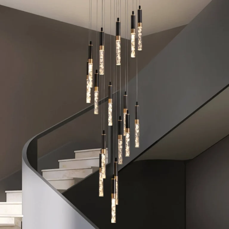 Large Foyer Chandelier Cascading Over a Modern Staircase