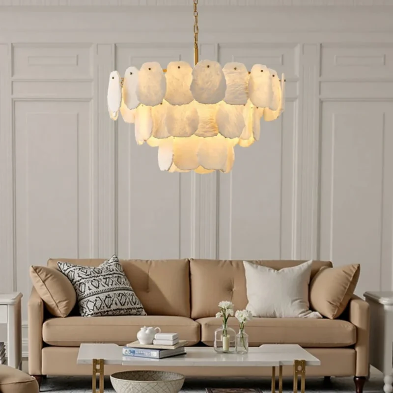 Luxury layered alabaster chandelier installed in a neutral toned high-end living room