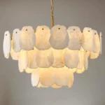 Layered round alabaster chandelier showing intricate hand-selected stone craftsmanship