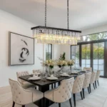 Contemporary Linear Crystal Chandelier in a Large Open Dining Space