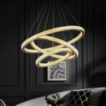 Minimalist LED Ring Chandelier on Dark Accent Wall