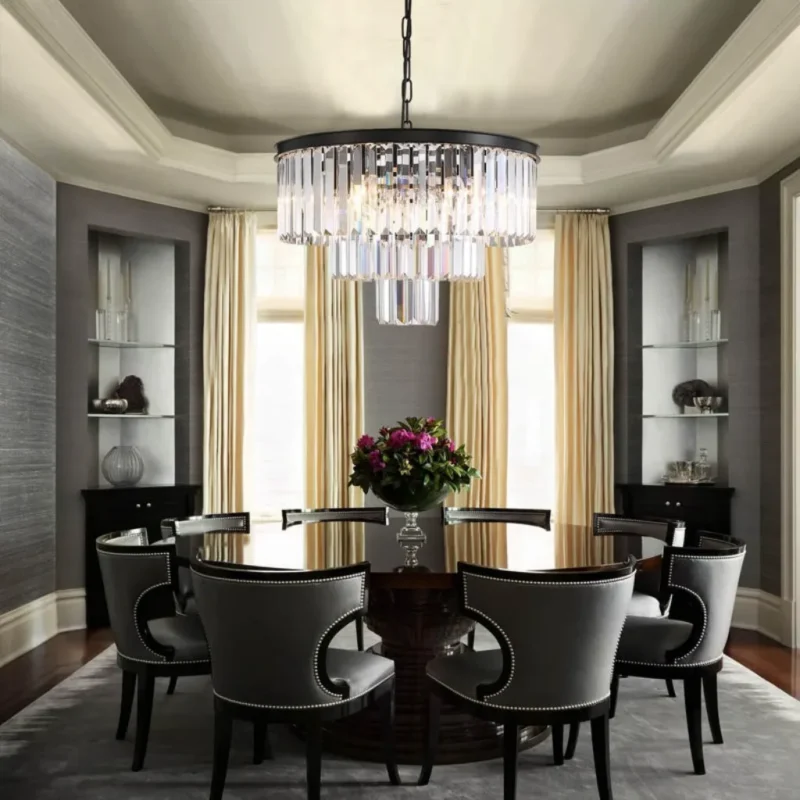 Modern Black Chandelier Centered Over a Contemporary Round Dining Table