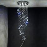 Butterfly Chandelier Installation in High Ceiling Stairwell