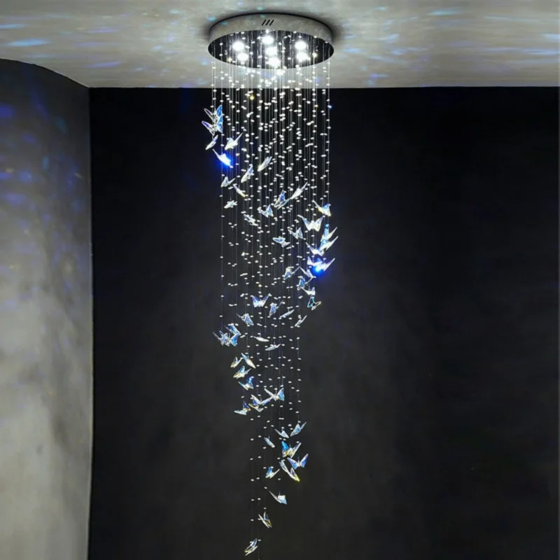 Butterfly Chandelier Installation in High Ceiling Stairwell