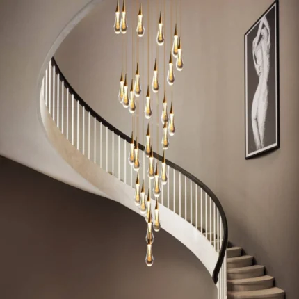 Modern 16-light linear dining chandelier with glass globes installed over a large wooden table