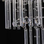 Macro detail of premium K9 crystals and precision-cut raindrops of the luxury chandelier.
