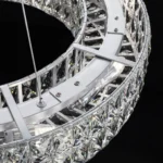 Inner Metal Frame and Bulb Socket View of a Silver Crystal Drum Chandelier