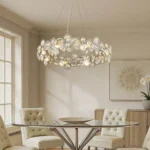 Vintage Crystal Chandelier Over Glass Table in Modern Dining Space