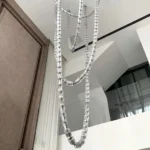 Detailed view of cascading crystal beaded pendant light showing jewelry inspired craftsmanship