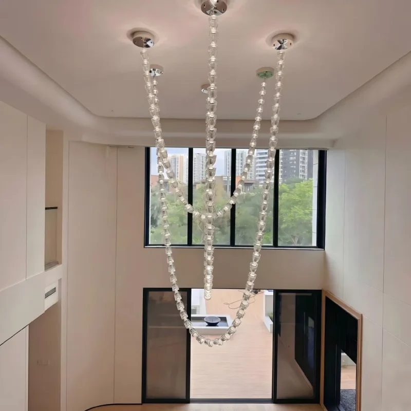 Waterfall crystal beaded chandelier for luxury foyer lighting in a duplex home