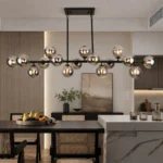 Black Mid Century Modern Chandelier over kitchen island