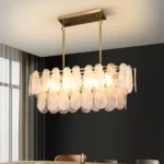 Modern gold glass chandelier with handcrafted glass shades in a contemporary interior