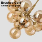 Amber glass globe chandelier with brushed gold frame