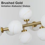 Brushed gold chandelier with hand-painted alabaster-look glass globe shades