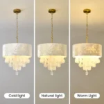 Capiz chandelier shown with cold natural and warm light bulb options