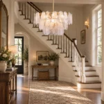 Coastal chandelier with cloud glass near a staircase