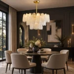 Coastal dining chandelier with cloud glass above a round dining table
