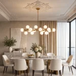 Contemporary gold chandelier with 16 alabaster-like glass globes in a dining room