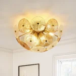 Close-up of glass disc chandelier with clear and amber textured glass accents