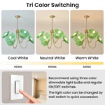 Green flower chandelier showing three light colors with compatible E26 bulbs