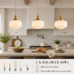 Milk glass pendant lights above a kitchen island with E26 bulb base