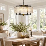 Modern farmhouse chandelier with water ripple glass above a dining table