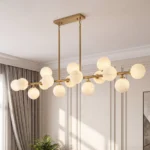 Modern globe chandelier with gold frame and hand-painted glass globe shades
