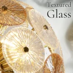 Textured glass disc chandelier detail showing clear and amber glass surfaces