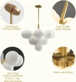 Close-up of white globe chandelier with milk glass shades and gold frame