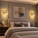 Matching crystal wall sconces with smoke gray and clear crystals on both sides of a bedroom bed.