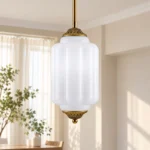 Farmhouse pendant light with ribbed milk glass shade and antique bronze finish