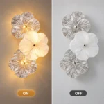 Three-flower glass wall sconce showing illuminated and unlit appearances side by side