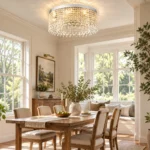 Round crystal flush mount chandelier above a dining table