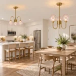 3-light and 5-light glass bubble chandeliers above a kitchen island and dining area