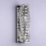 Unlit chrome rectangular K9 crystal wall sconce showing its clear crystal structure and metal backplate