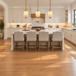 Kitchen island pendant lights with ribbed milk glass shades in a farmhouse kitchen