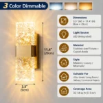 Stainless steel crystal wall sconce with three color LED lighting option and dimensions of 3.5 by 11.4 inches