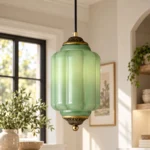 Vintage green glass pendant lamp with ribbed shade and antique gold metal details